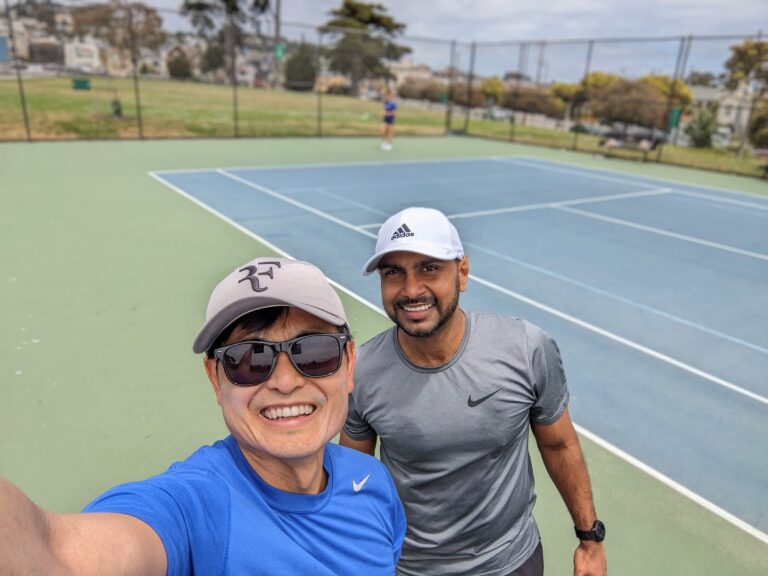 Tony and Malinka taking a selfie on the courts at Balboa Park